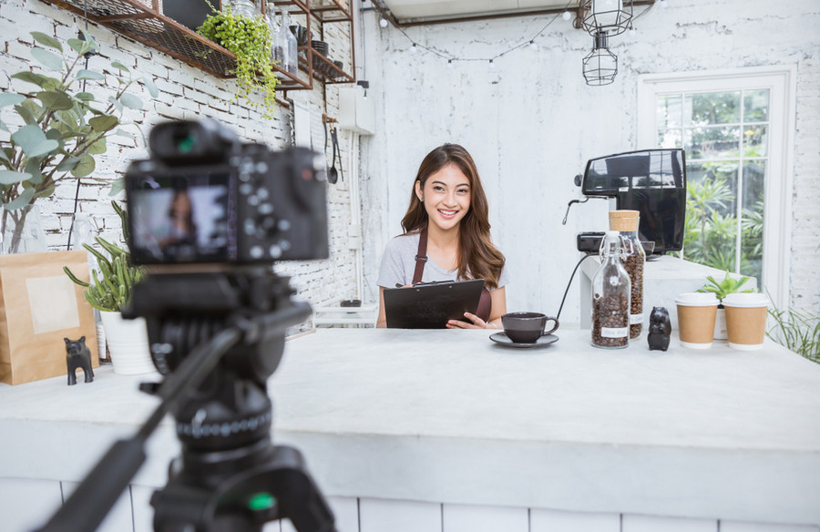 Small business owner filming her video marketing